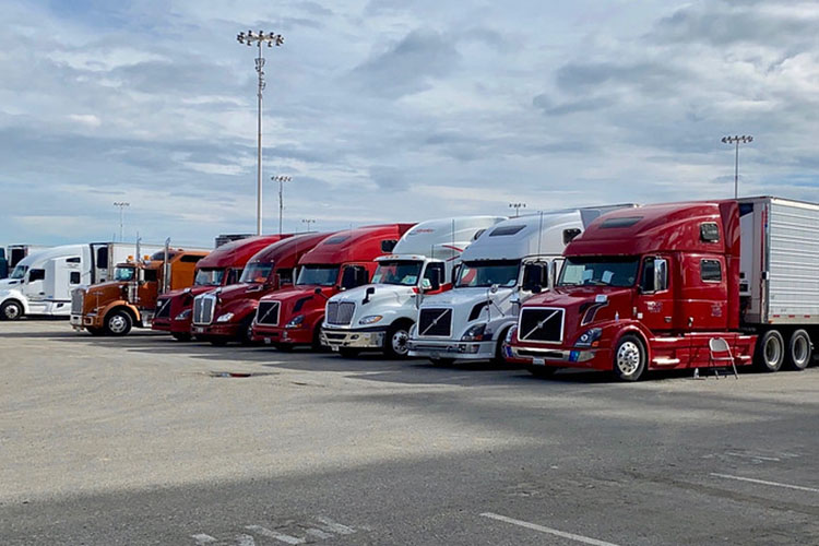 a line of tractor trailers