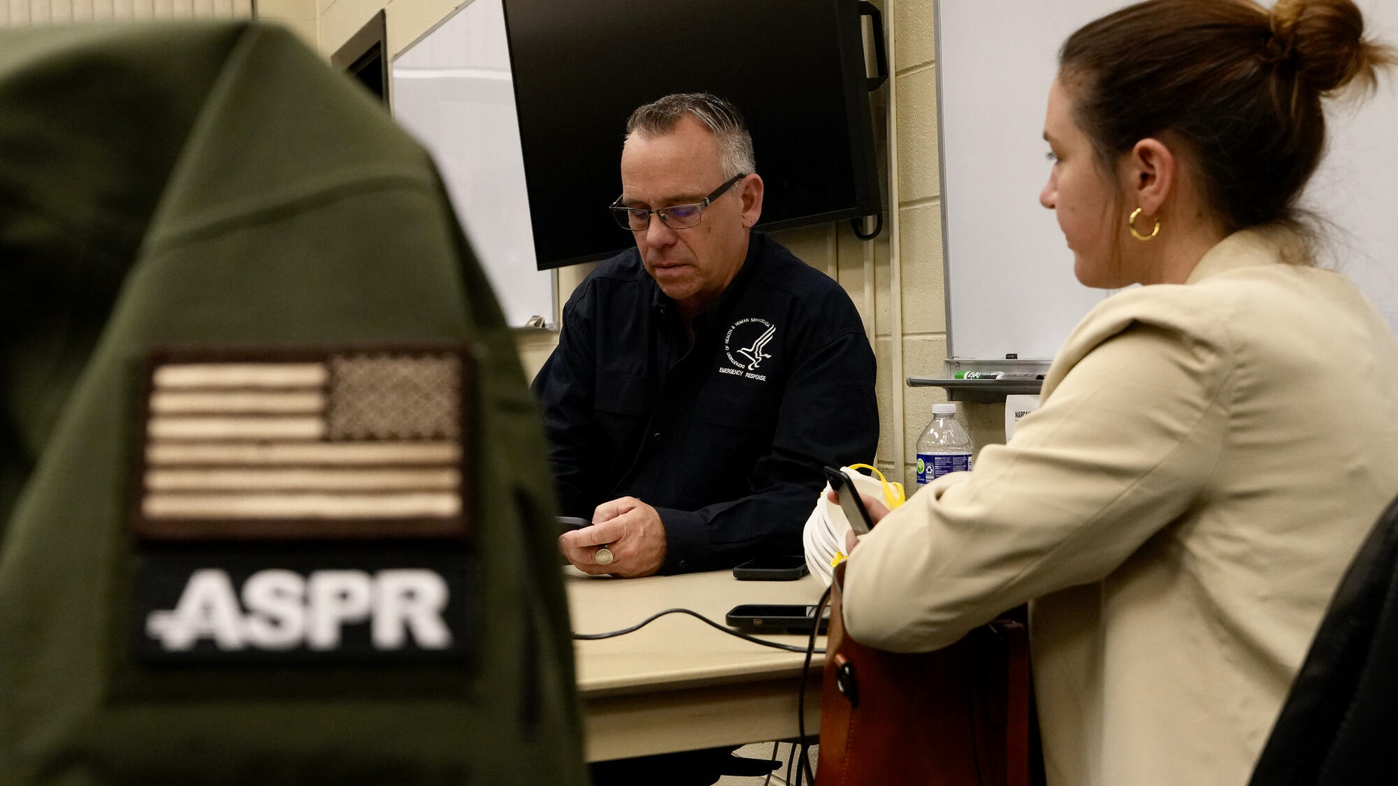 HHS Principal Deputy Assistant Secretary for Preparedness and Response Knox prepares for the arrival of plane carrying repatriated Americans following the hantavirus outbreak on the MV Hondius.