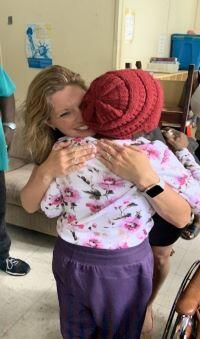 Woman holding child