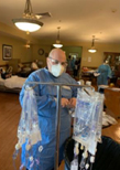 Medical professional preparing IV infusion bags