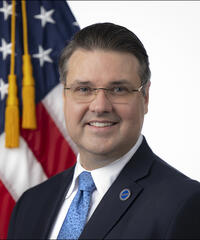 Portrait of Matthew Van Patton with American Flag