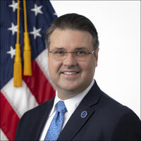 Portrait of Matthew Van Patton with American Flag