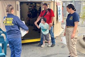 Following Hurricane Helene, ASPR's Jennifer Sawicky and Lindsey Corrente help Brandon Pitman get life-saving medication for his son Gabriel.